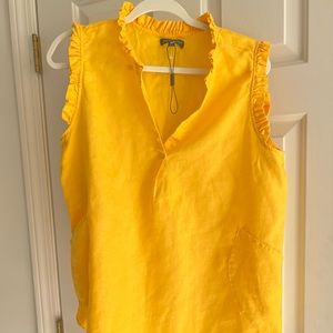 Rich yellow sleeveless blouse. Never worn